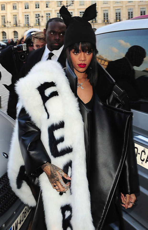 Rihanna at the Comme des Garçons A/W 2014 show in faux fur ‘fear’ stole.