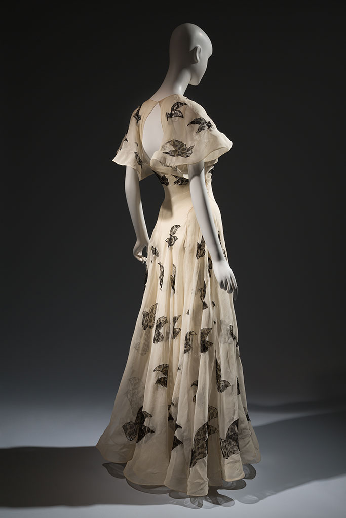 Madeleine Vionnet ivory silk organza gown with black lace insets, 1937, Paris, lent by Beverley Birks | copyright MFIT. Photo by Eileen Costa