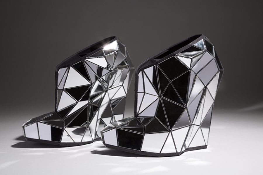 High wedge heel close-toed shoes with faceted black nylon framework and mirrored glass inserts.
