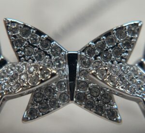 rhinestone covered metal bow in silver