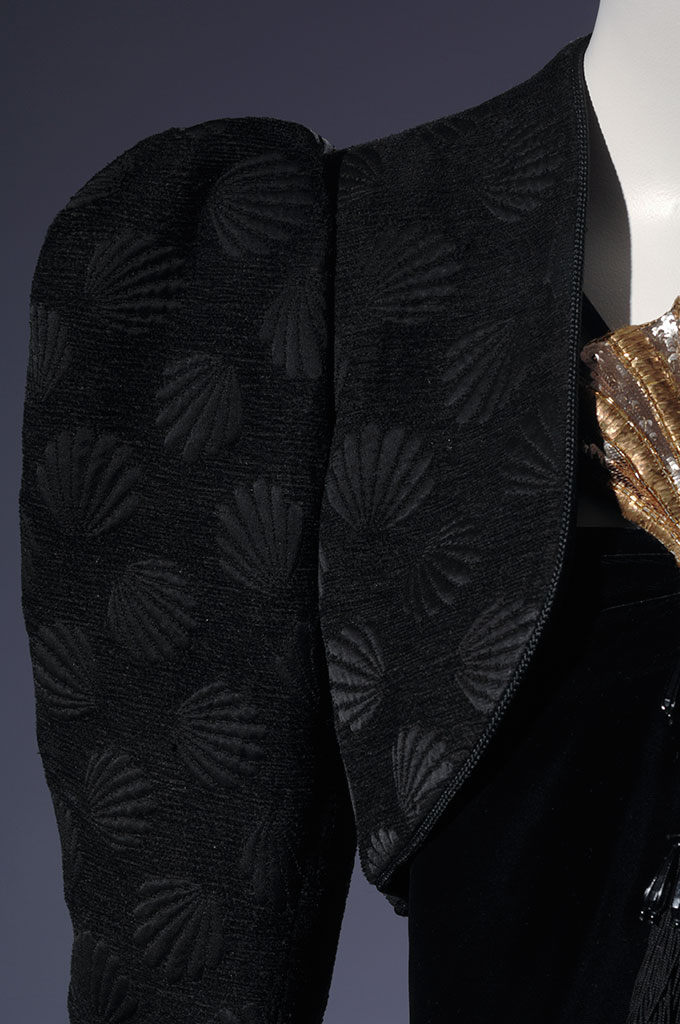 (detail) Yves Saint Laurent evening ensemble, black textured silk, velvet, and gold lame, France, gift of Marina Schiano