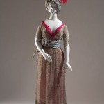 Poiret Claims Credit | The French couturier Paul Poiret always hotly denied that he had been influenced by the Ballets Russes. Although the historical evidence contradicts his claim to have pioneered the “Oriental” look in fashion, he certainly played an important role in popularizing it. Poiret designed this costume for a fancy dress party in 1919. Paul Poiret Tunic, trousers, turban, wig, slippers, faux scimitar, 1919, 74.36.29, gift of Mrs. Katheryn Colton