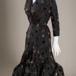 Balenciaga and Spain | The Spanish couturier Cristobal Balenciaga was instrumental in bringing the flamenco dancer’s ruffled dress into fashion. This dress was made in his couture house in Paris, where he served an international clientele. Balenciaga Dress, 1950 The Museum at FIT, 86.142.5 Gift of Jerome Zipkin