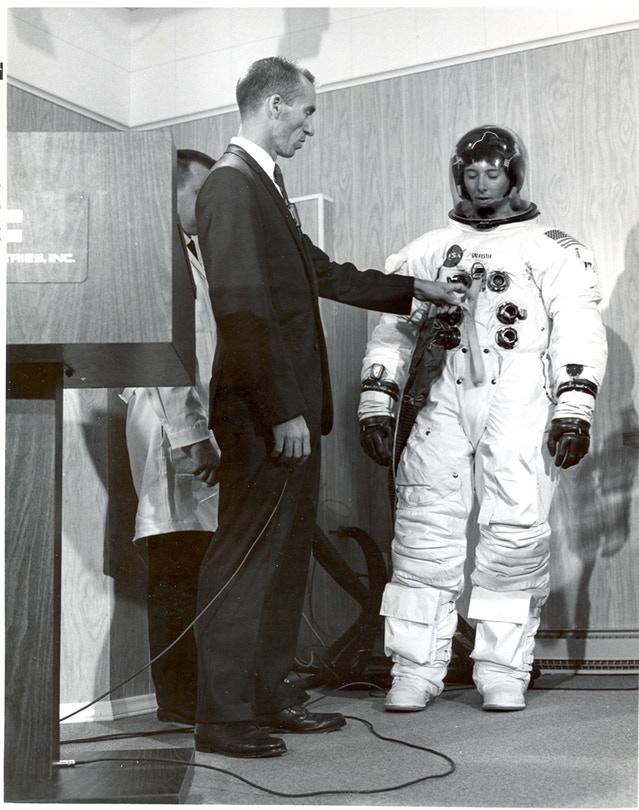 Astronaut Walt Cunningham at ILC Dover presenting the Apollo suit to the national press. Courtesy of ILC Dover, Inc.