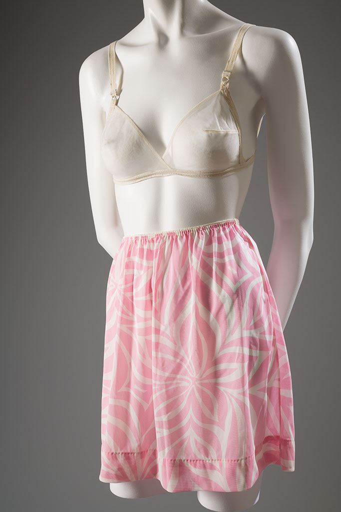 Rudi Gernreich for Exquisite Form, “No-Bra” and half-slip, sheer white nylon, pink and white printed nylon, circa 1965, USA, gifts of Mitch Rein