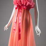 Actress Carroll Baker wore a hip-length, ruffled nightie and matching pantalets in the 1956 movie Baby Doll. The movie helped to popularize short, billowing sleepwear styles. Vanity Fair was known for its fashionable and brilliantly colored nylon sleepwear, which was both inexpensive and easy to care for. Nylon tricot, circa 1960, USA, 87.82.5, gift of Dorothy Pollack