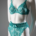 Victoria’s Secret was founded as a mail-order catalog in 1977, corresponding to renewed interest in ultra-feminine lingerie styles. Now a household name, the brand specializes in designs that are stylish and sexy, yet accessible. Brightly colored fabrics, such as the teal lace used for this set, have become a hallmark of the Victoria’s Secret style. Lace, 1990, USA, 90.161.3, gift of Victoria’s Secret