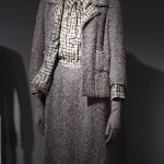 French couturier Jean-Louis Scherrer copied Chanel’s iconic threepiece suit during the height of its popularity. He incorporated all the hallmarks of a Chanel suit, including its fabric, self-tie blouse, chain, and lion-head buttons. Chanel’s reaction is unknown, but she once said, “The very idea of protecting the seasonal arts is childish. One should not bother to protect that which dies the minute it is born.” Wool tweed, silk, metal, circa 1964, France, 2014.15.24, gift of Cristina Noble