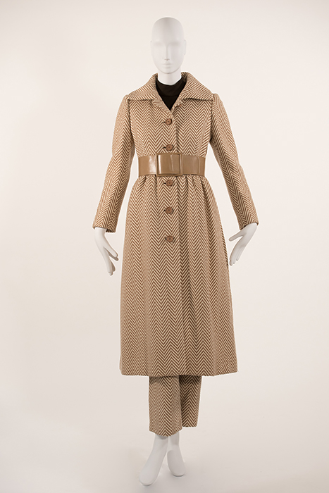 brown coat and pants with herringbone pattern and brown belt around waist