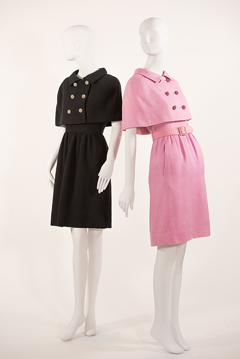 (left) black dress with mini cape that has double breasted buttons (right) pink belted dress with mini cape that has double-breasted pink buttons