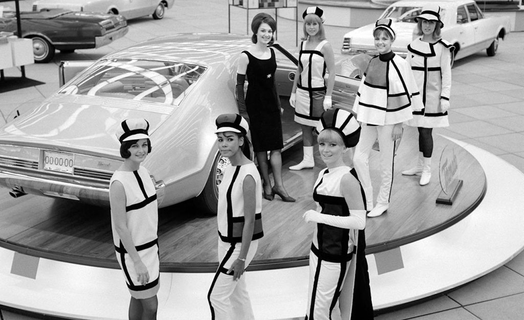 Models wearing Saint Laurent-inspired ensembles at the Detroit Auto Show, 1966 Photograph © Car & Driver