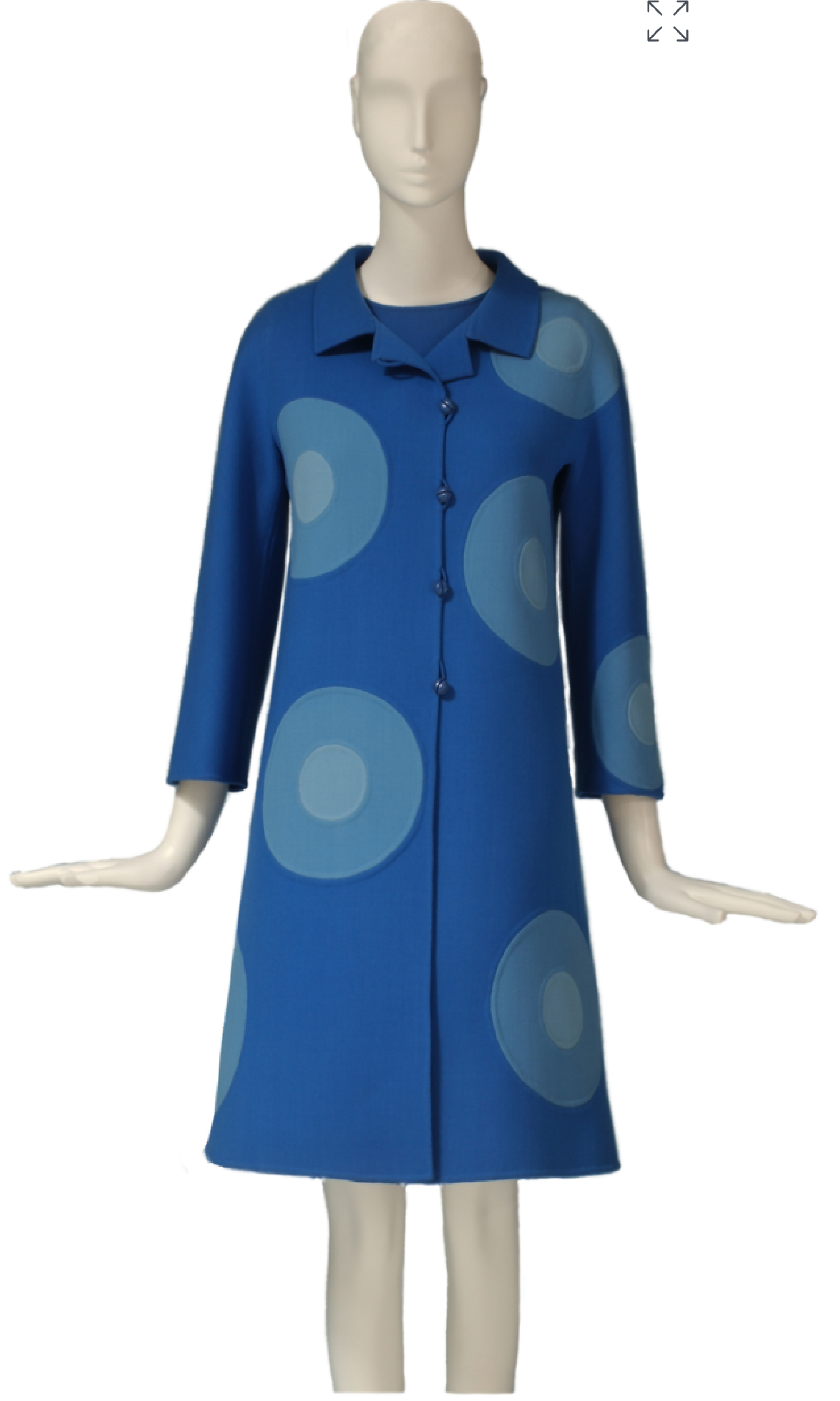 Front view of 1968 Mila Schön set containing a long sleeve, above the knee blue double faced wool coat and dress set. The coat has large concentric circles in two complimentary shades of blue.