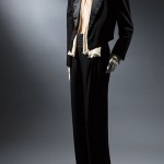 Saint Laurent Rive Gauche Black “le smoking” evening suit. Wool, satin, and silk crepe, circa 1982, France, 91.255.4, gift from The Estate of Tina Chow